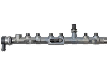 A Cummins 19-21 6.7L fuel rail for an internal combustion engine with multiple connection points and fittings, isolated on a transparent background by Dynomite Diesel.