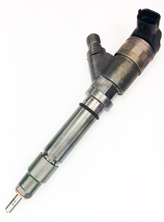 A close-up of a Dynomite Diesel Duramax 04.5-05 LLY Individual Stock Brand New Injector on a white background, showing its detailed metal body and top electrical connector.